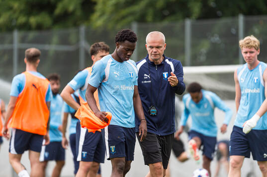 Isaac Assibu och huvudtränare Gaute Helstrup