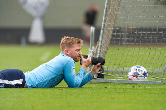Anders Christiansen fotograferar