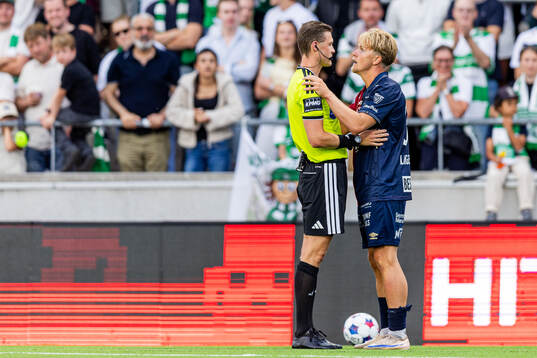 Domare Erik Mattsson och Örgrytes Sebastian Lagerlund