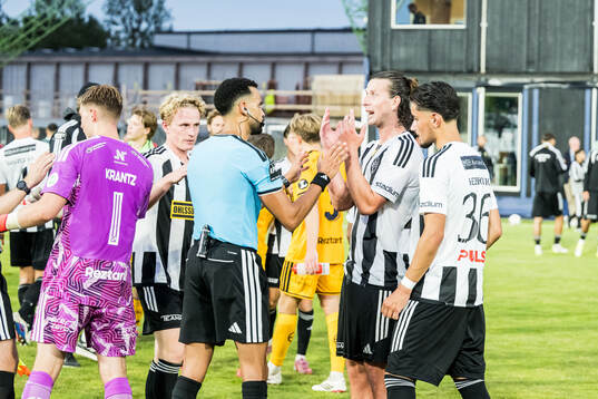 Domare Farouk nehdi och Landskronas Andreas Murbeck och