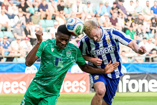 Victory Iboro of Levadia Tallinn and Adam Bergmark Wiberg