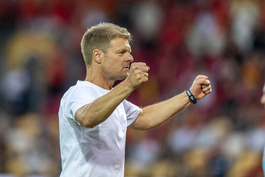 Head coach Jens Fønsskov Olsen of Nordsjälland celebrates