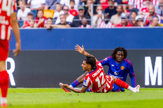 Carlos Martín of Atletico de Madrid and Patrick Dorgu of