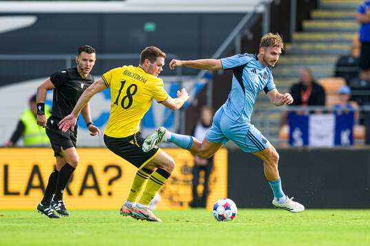 Jacob Bergström of Mjällby and Peter Pokorný of Slovan
