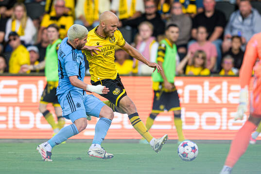 Cristian Martinez of Slovan Bratislava and Viktor Gustafson