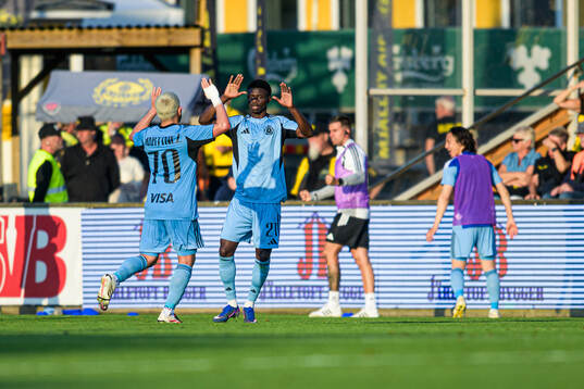 Cristian Martinez and Suleiman Camara Sanneh of Slovan