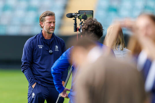 head coach Rik De Mil