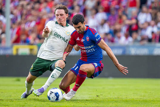 Noah Persson of Hammarby and Mahir Emreli of Rakow fight