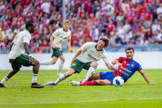 Noah Persson of Hammarby and Mahir Emreli of Rakow