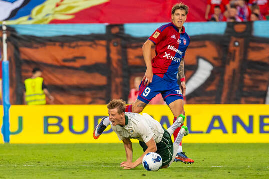 Frederik Winther of Hammarby and Patryk Makuch of Rakow