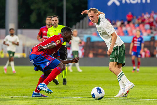 Dieudonne Gaucho Debohi of Rakow and Victor Lind of Hammarby