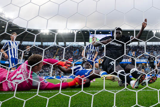Goalkeeper Viktor Andersson and Rockson Yeboah  of IFK