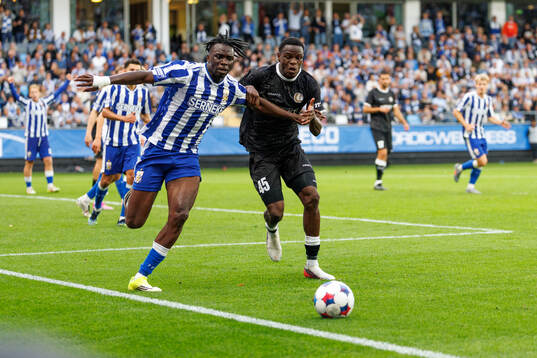 Rockson Yeboah of IFK Göteborg and Hyllarion Goore of Gent