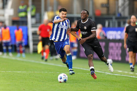 Alexander Jallow of IFK Göteborg and Hyllarion Goore of