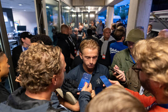 Noah Tolf of IFK Göteborg speaks to media outside the
