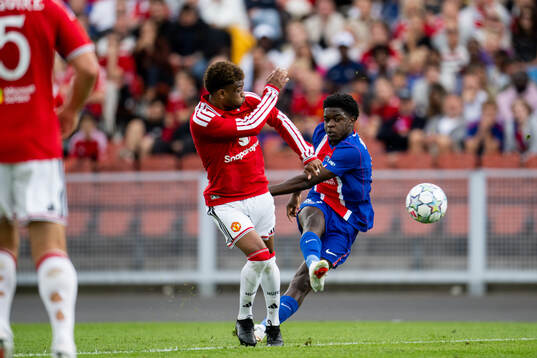Diallo Amad of Manchester Uniteds and Ndjantou of Paris