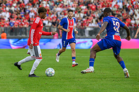 Manchester Uniteds Diallo Amad  and Paris Saint-Germains