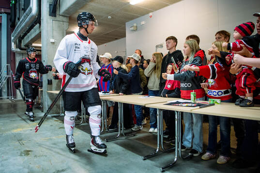 Isac Nilsson och supportrar