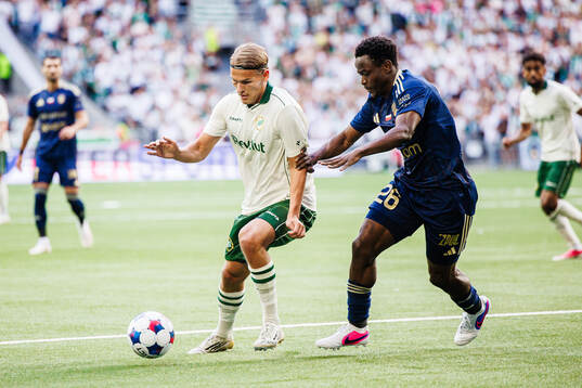 Markus Karlsson of Hammarby and Erick Ouma Otieno of Rakow