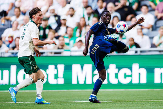 Noah Persson of Hammarby and Debohi Dieudonne Gaucho of