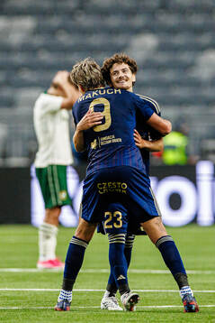 Patryk Makuch and Karol Struski of Rakow celebrate