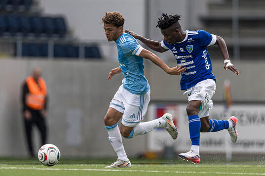 Gefles Malik Mokédé och Umeå FCs Fredrick Udoh Godwin