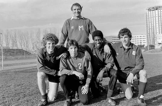 Manager Malcolm Allison with players Tommy Caton, Steve