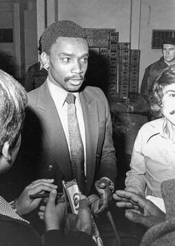 Laurie Cunningham with journalists