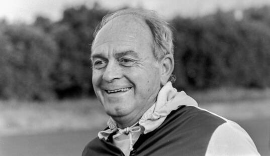 Manager Alfredo di Stefano smiling