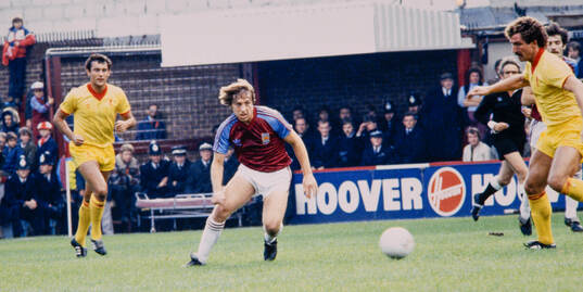 Geoff Pike of West Ham against Ray Kennedy and Grame