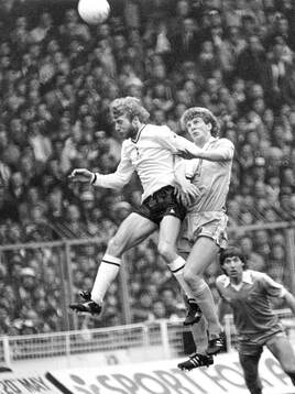 Tottenhams Steve Archibald against Citys Tommy Caton