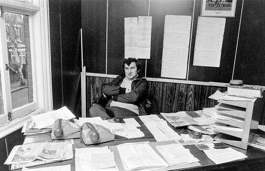 Manager David Pleat of Luton at his office
