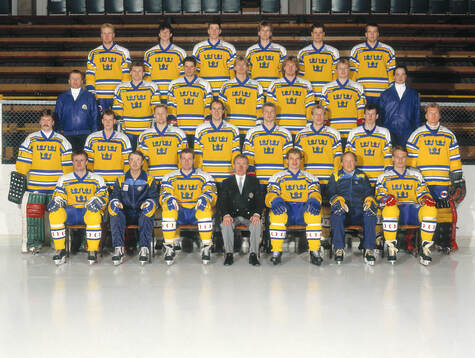 Players and team staff of Sweden pose for a team photo