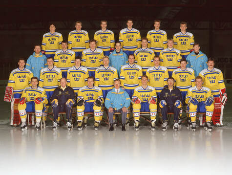 Players and team staff of Sweden pose for a team photo