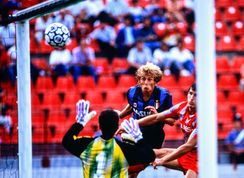 Inters Jürgen Klinsmann scores with a header