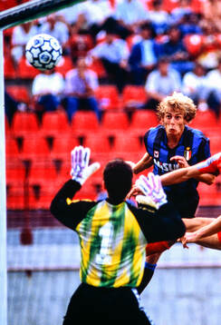 Inters Jürgen Klinsmann scores with a header