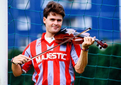 Anders Limpar of Cremonese with a violin
