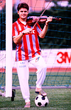 Anders Limpar of Cremonese with a violin