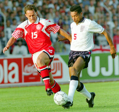 Englands Des Walker (R) against Denmarks Bent Christensen