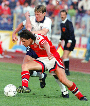 Denmarks Flemming Povlsen against Englands Stuart Pearce
