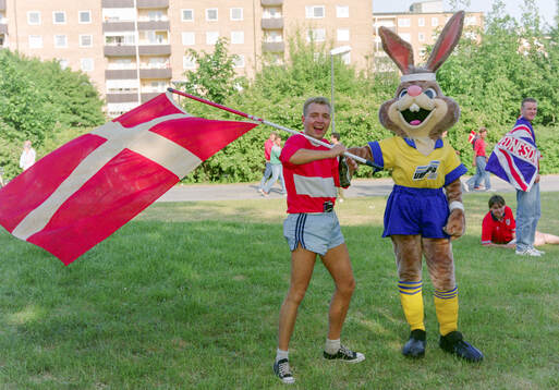 A Danish fan meets the tournament mascot Berni the rabbit