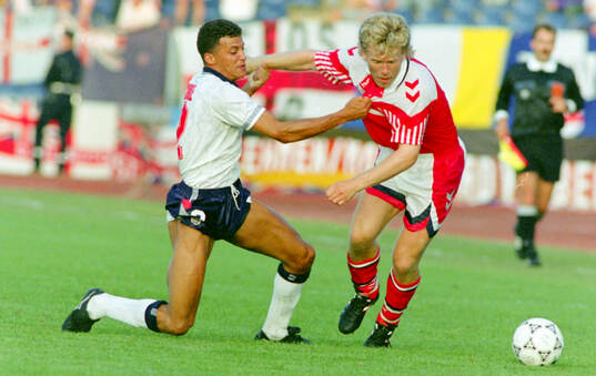 Denmarks Henrik Andersen (R) against Englands Keith Curle