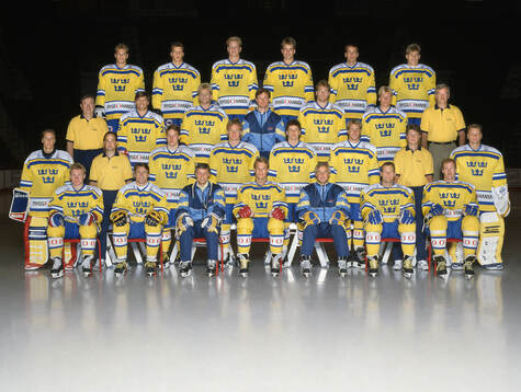 Players and team staff of Sweden pose for a team photo