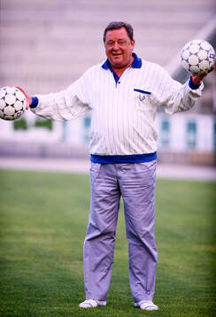 Lennart Johansson, president, UEFA, holding two footballs