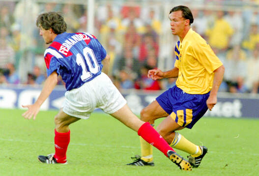 Swedens Joachim Bjorklund against Luis Fernandez of France