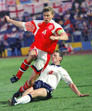 Denmarks Lars Olsen against Englands Stuart Pearce