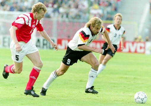 Germanys Rudi Voller against Oleg Kuznetsov of CIS