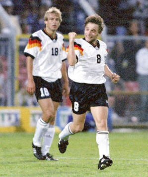 Germanys Thomas Hassler celebrates his equalizing goal in