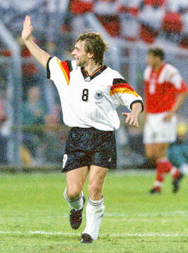Germanys Thomas Hassler celebrates his equalizing goal in