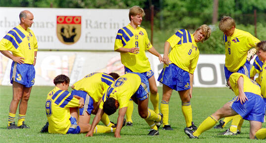 Swedens manager Tommy Svensson oversees training at